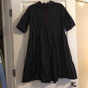 50’s black dress with red buttons